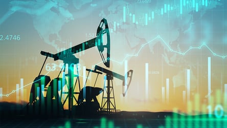Fluctuating oil prices. Oil pumping with graphs overlayed.