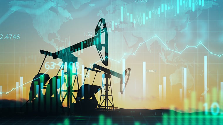Fluctuating oil prices. Oil pumping with graphs overlayed.