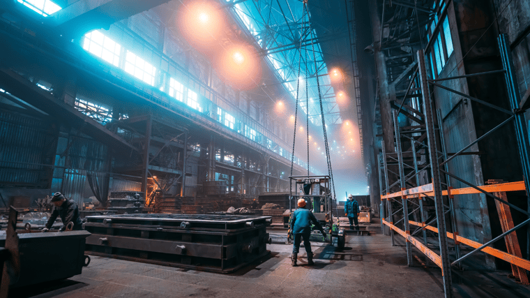 a warehouse worker with heavy machinery dramatic lighting