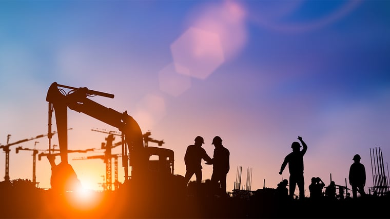 Silhouette of engineer and construction team working at site over blurred background for industry background with Light fair.Create from multiple reference images together